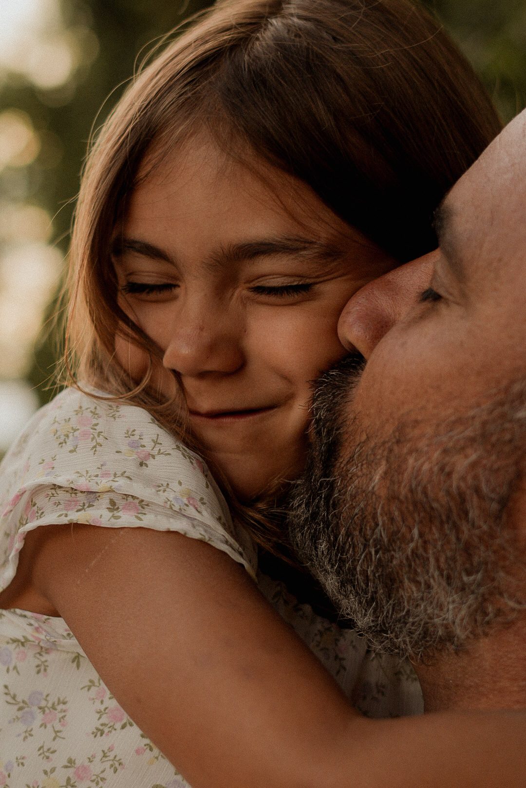 A tender moment between father and daughter