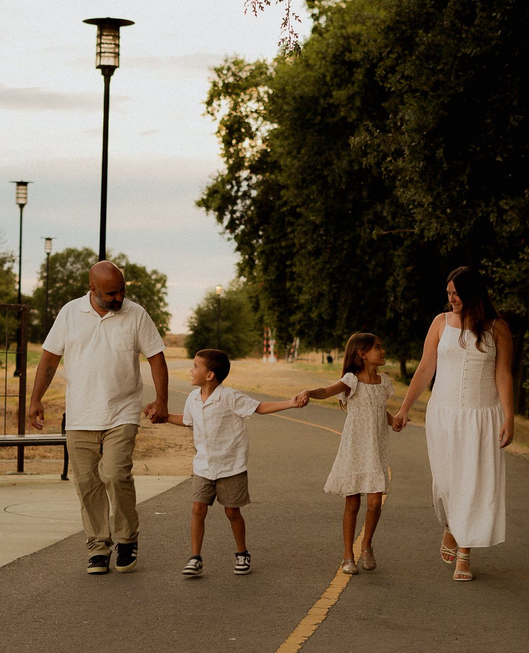 Family walking together in the evening light