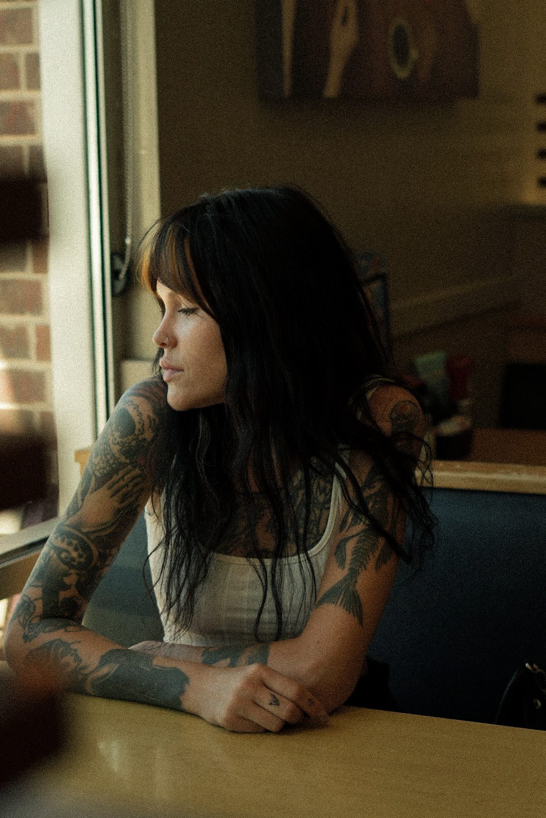 A quiet portrait by a window